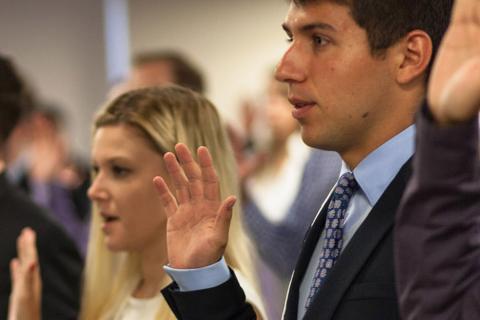 students taking oath